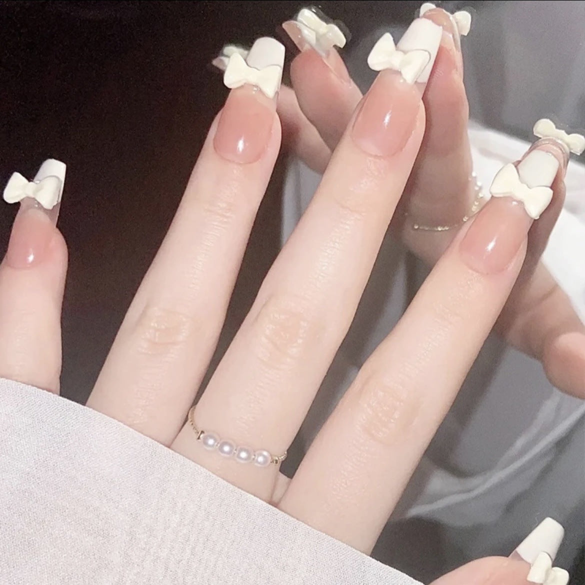 Kunstvolle Nagelverlängerungen mit Blumendesign Brehn