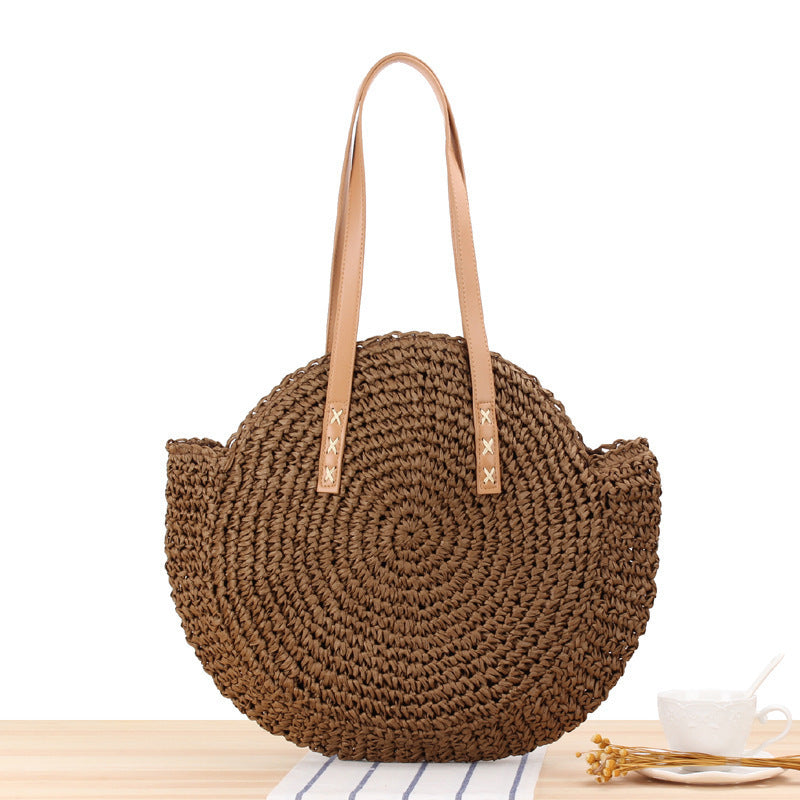Runde Strohtasche mit Ledergriffen Brehn