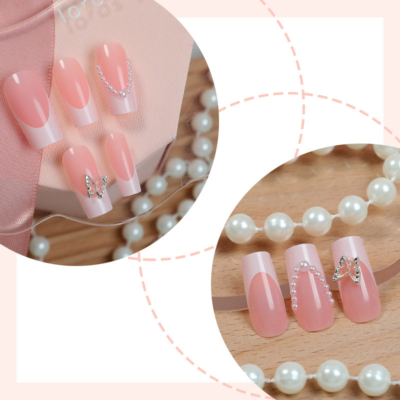 Künstlerisches Press-On Nagelset mit Schmetterlings- und Juwelenakzenten Brehn
