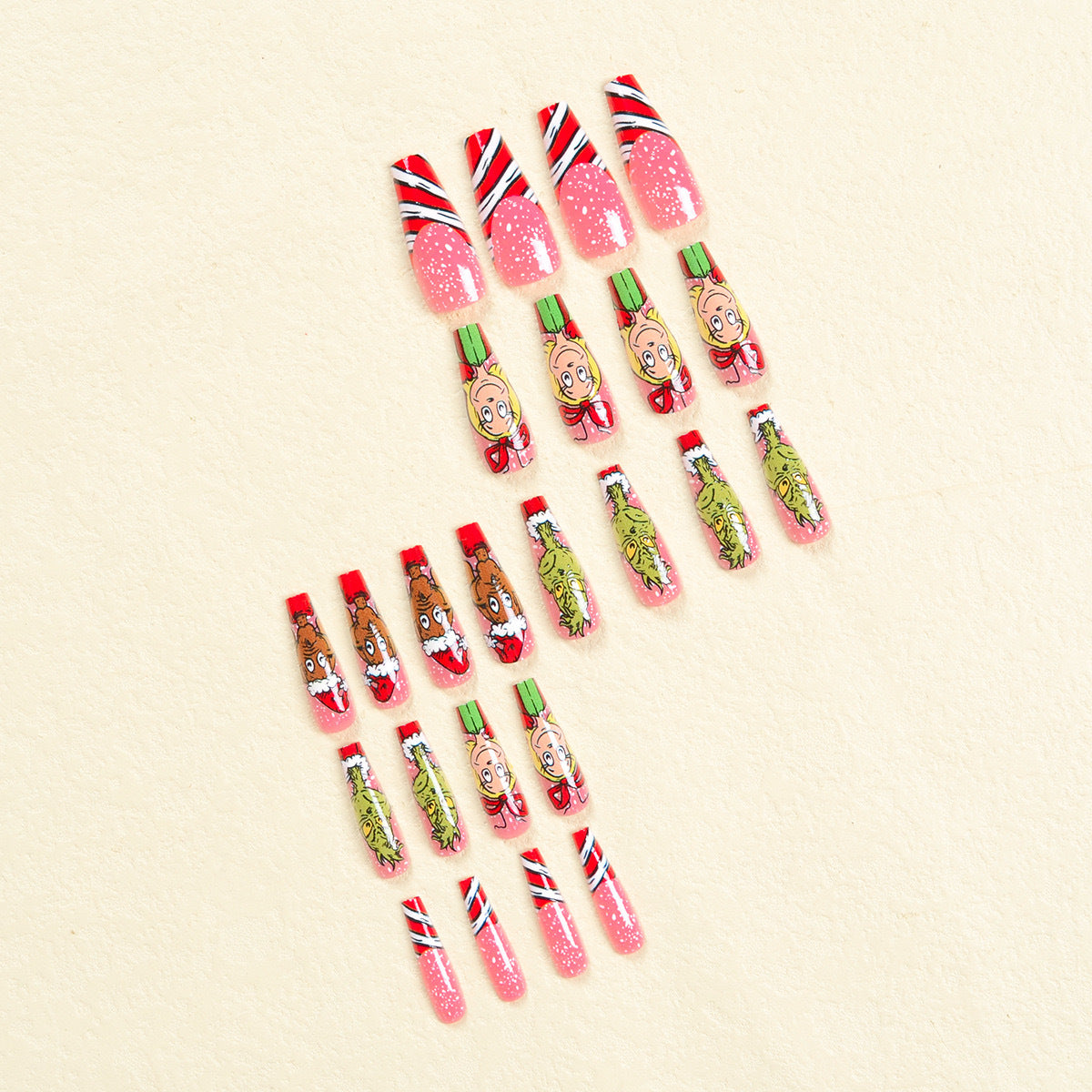 Kunstnagelset mit festlichen Motiven und charmantem Grinch Design Brehn