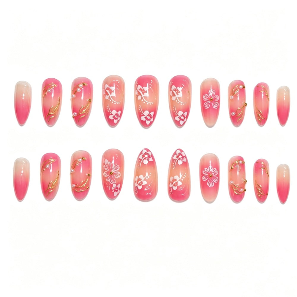 Künstlerisches Nagelkunst Press-On Nagelset mit floralen und goldenen Akzenten Brehn