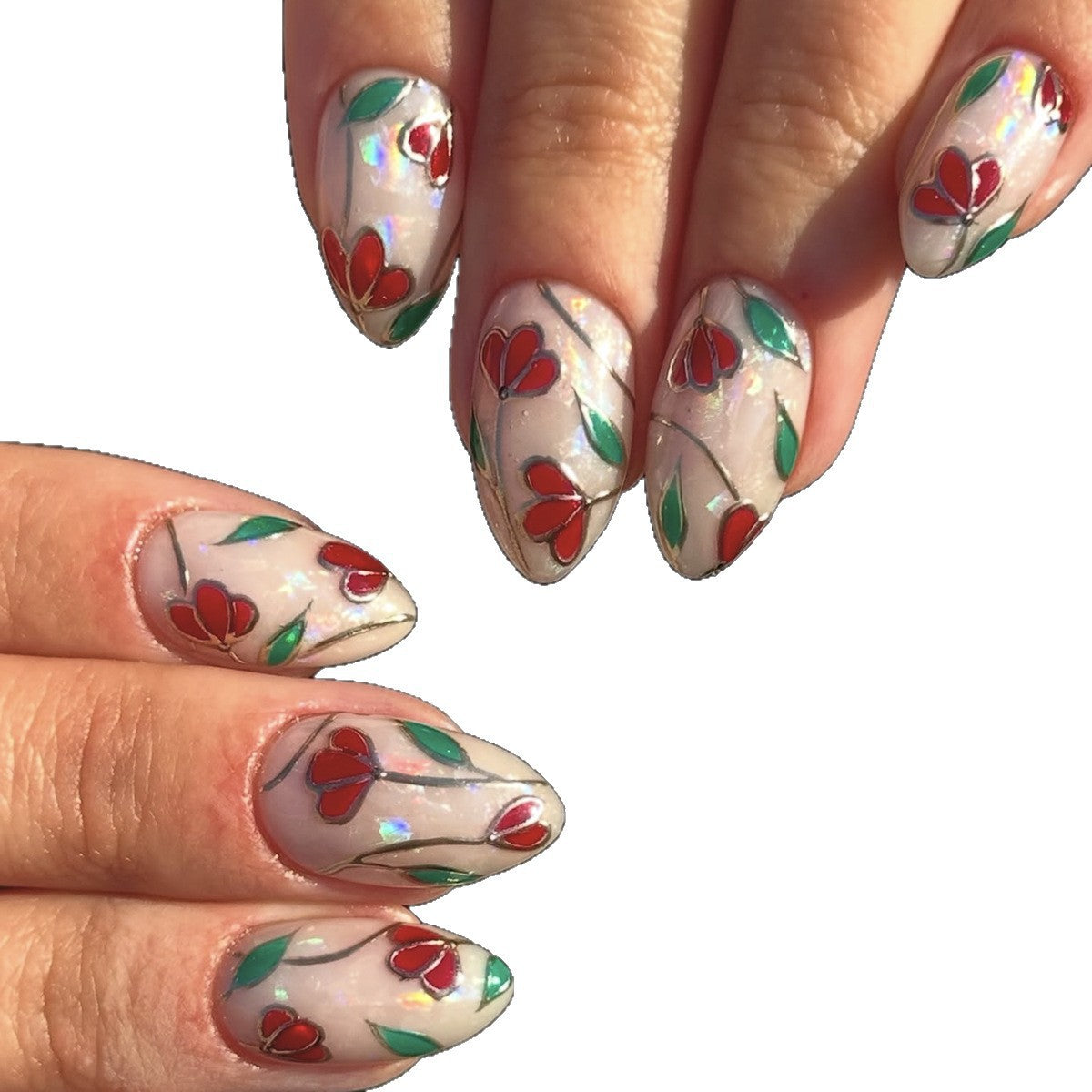 Kunstnagelset mit floralen Akzenten und Glitzer Brehn