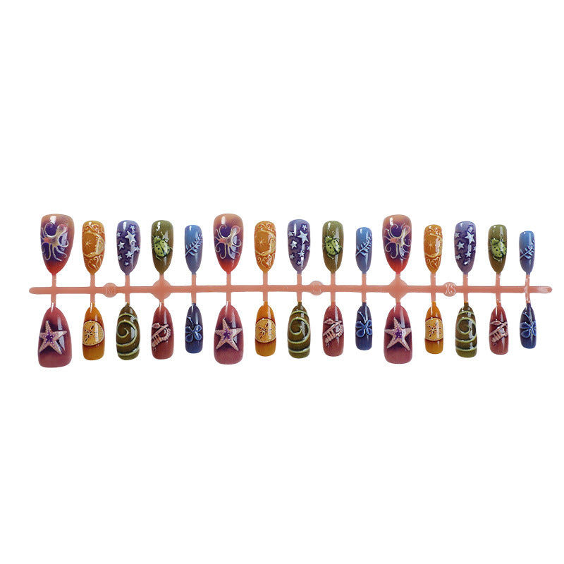 Kunstnagelset mit kreativen maritimen und naturinspirierten Motiven Brehn