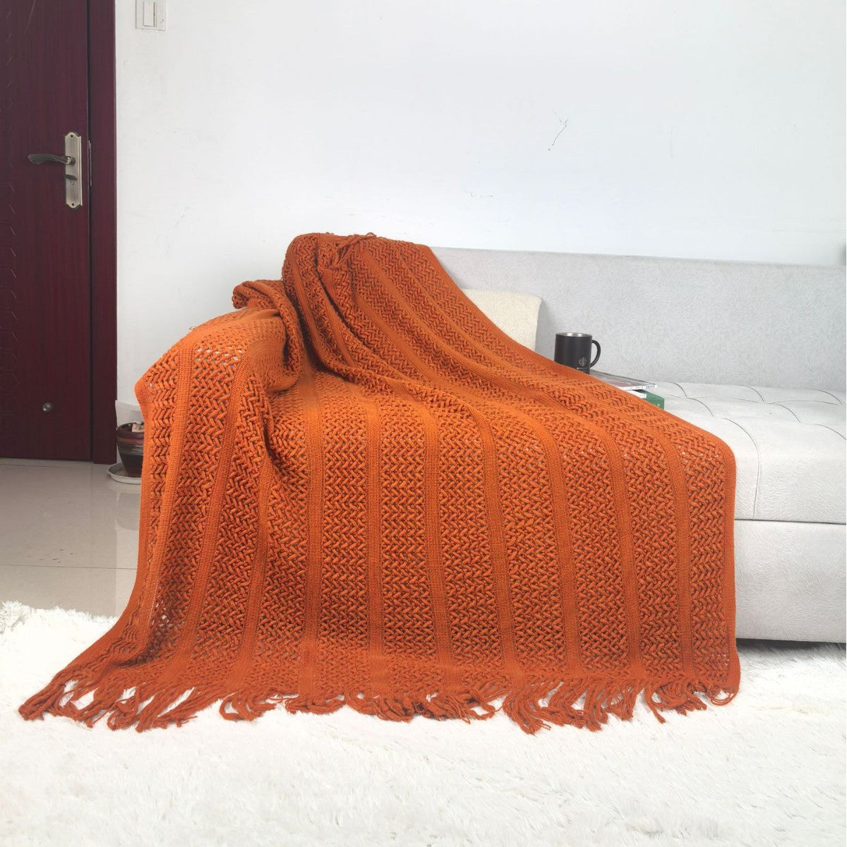 Handgefertigte strukturierte Strickdecke Brehn