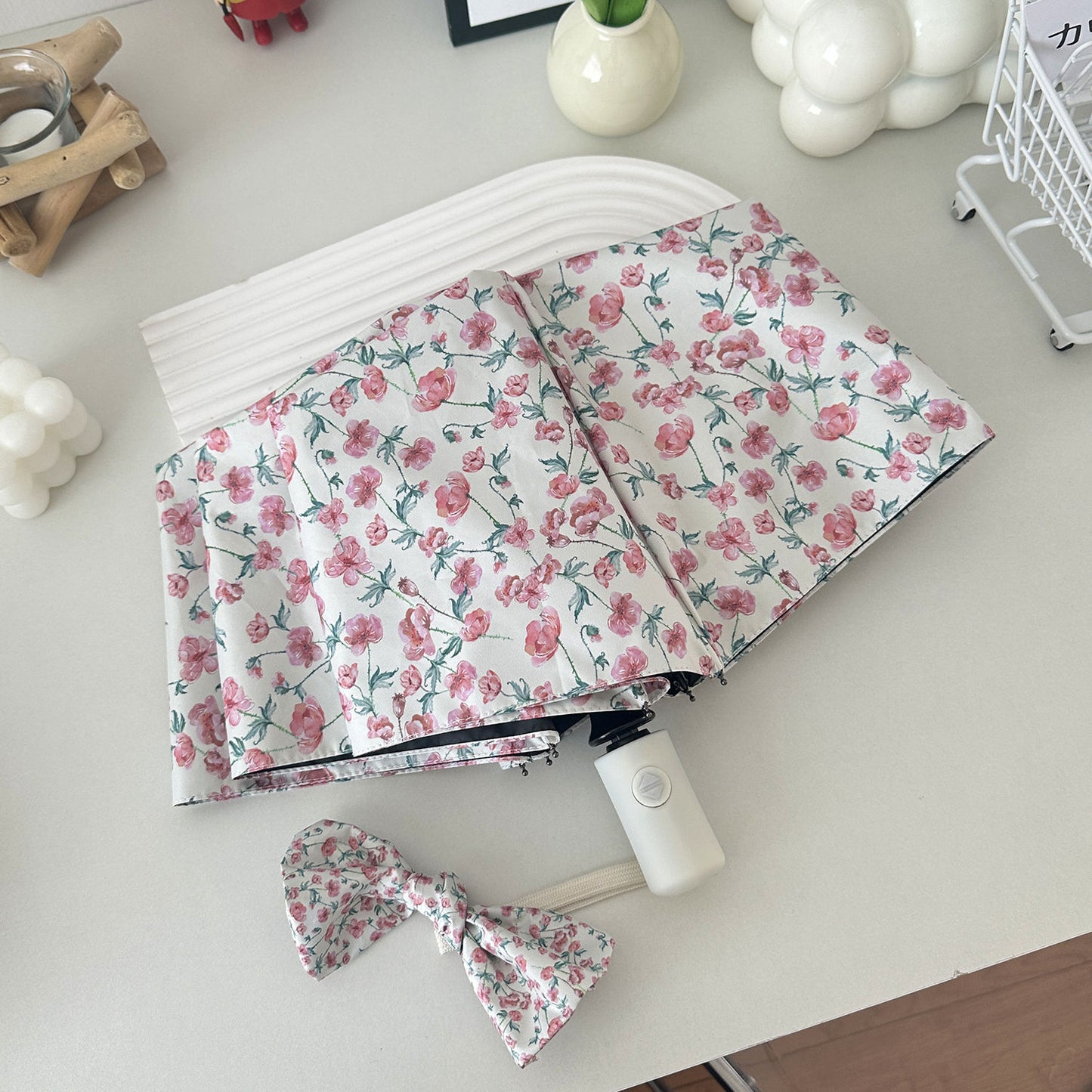 Damen Faltregenschirm mit floralem Design und praktischem Aufbewahrungssystem Brehn