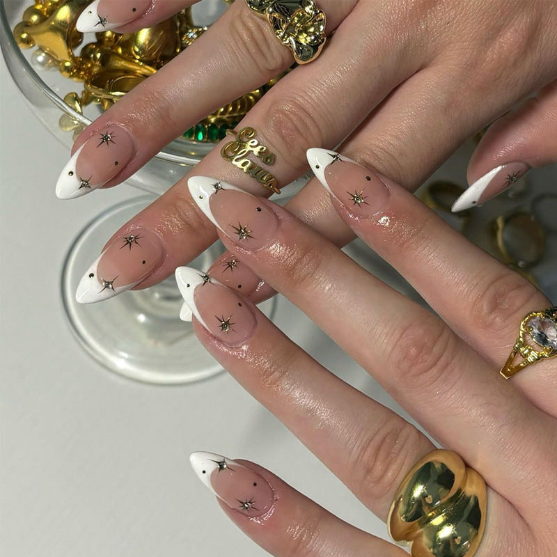 Künstlerische Stiletto Press-On Nagelkunst mit Stern- und Ombre-Design Brehn
