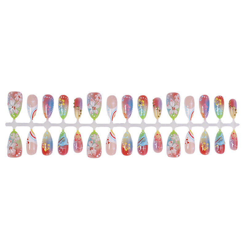 Kunstnagelset mit vielfältigen Designs und glänzenden Verzierungen Brehn