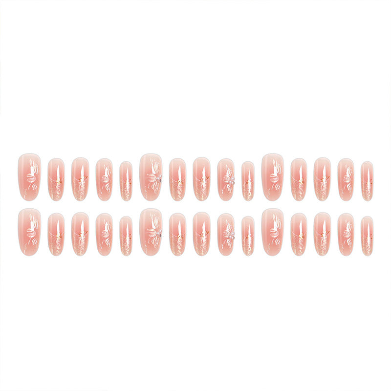Kunstnagelset mit filigranen Blumen- und Glitzerelementen Brehn