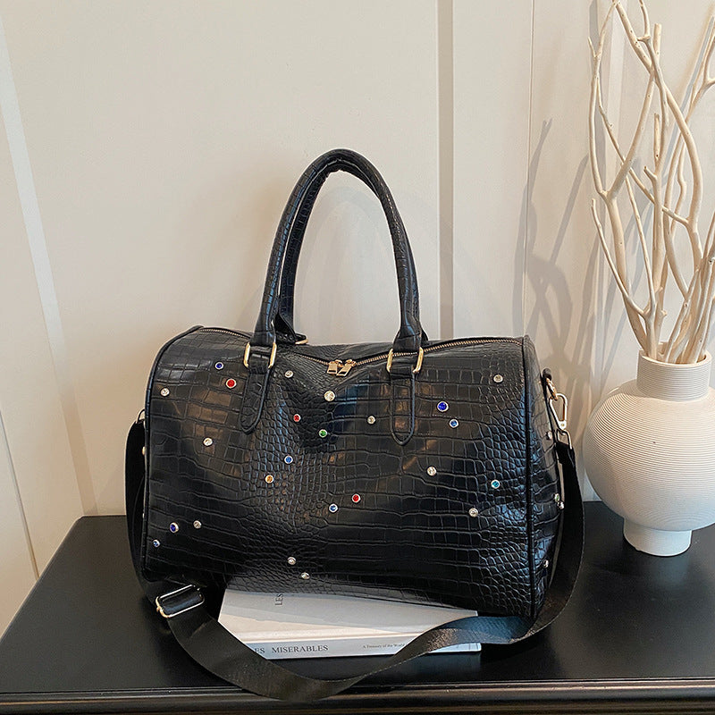 Elegante Handtasche mit Luxuriösem Kroko-Muster und Bunten Applikationen Brehn