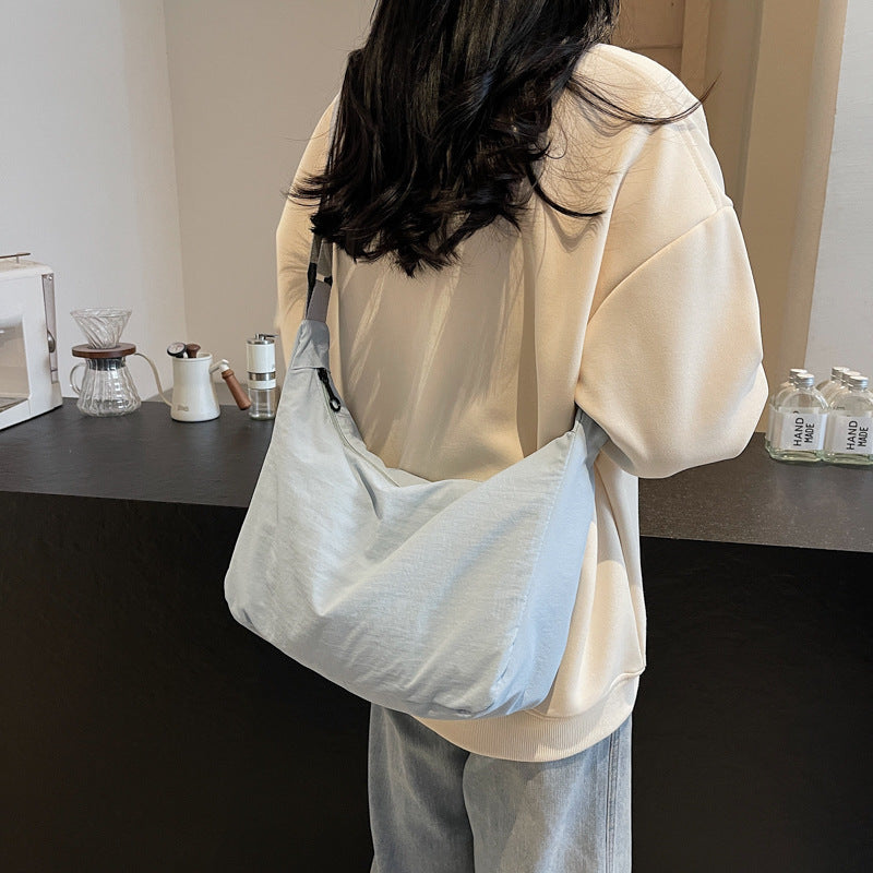 Sling Schultertasche