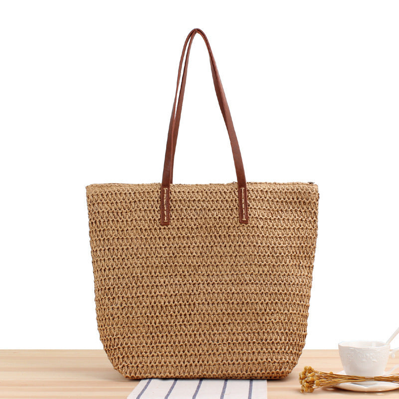 Elegante Bast-Handtasche mit Ledergriffen Brehn