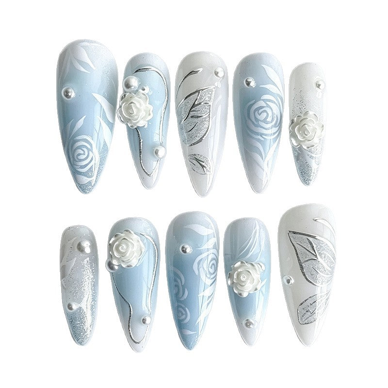 Kunstnagelset mit elegant floralen Motiven und Glitzereffekten Brehn
