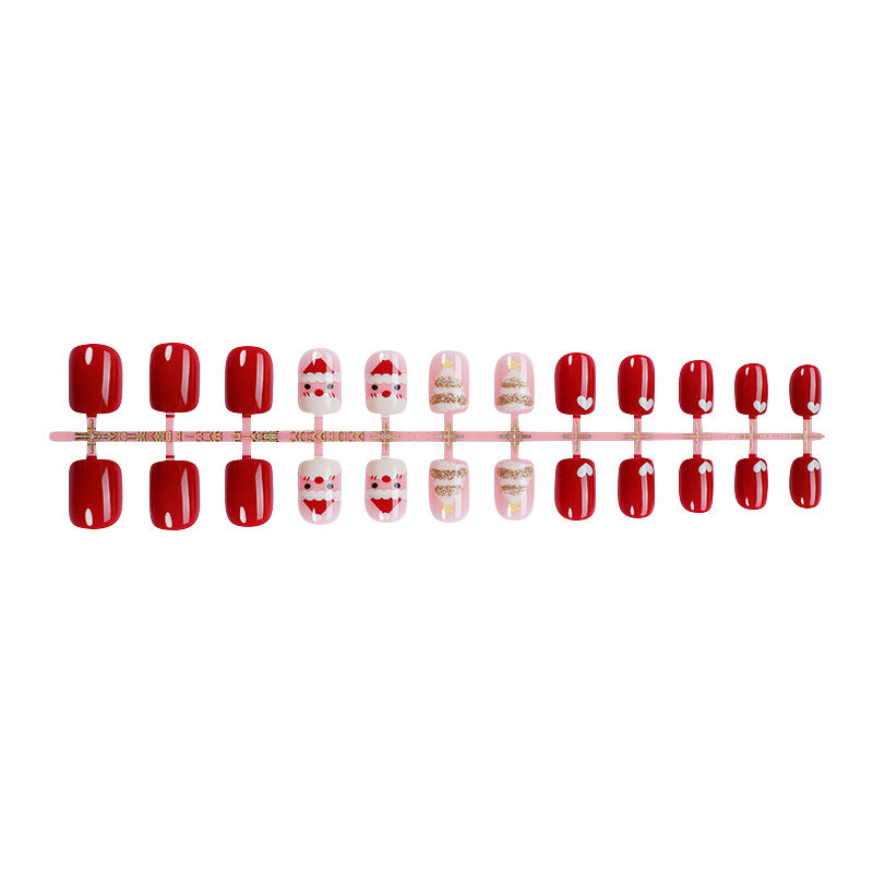 Urlaubs-Themen Press-On Nail Set mit lustigen Weihnachtsmann- und Herzdesigns Brehn