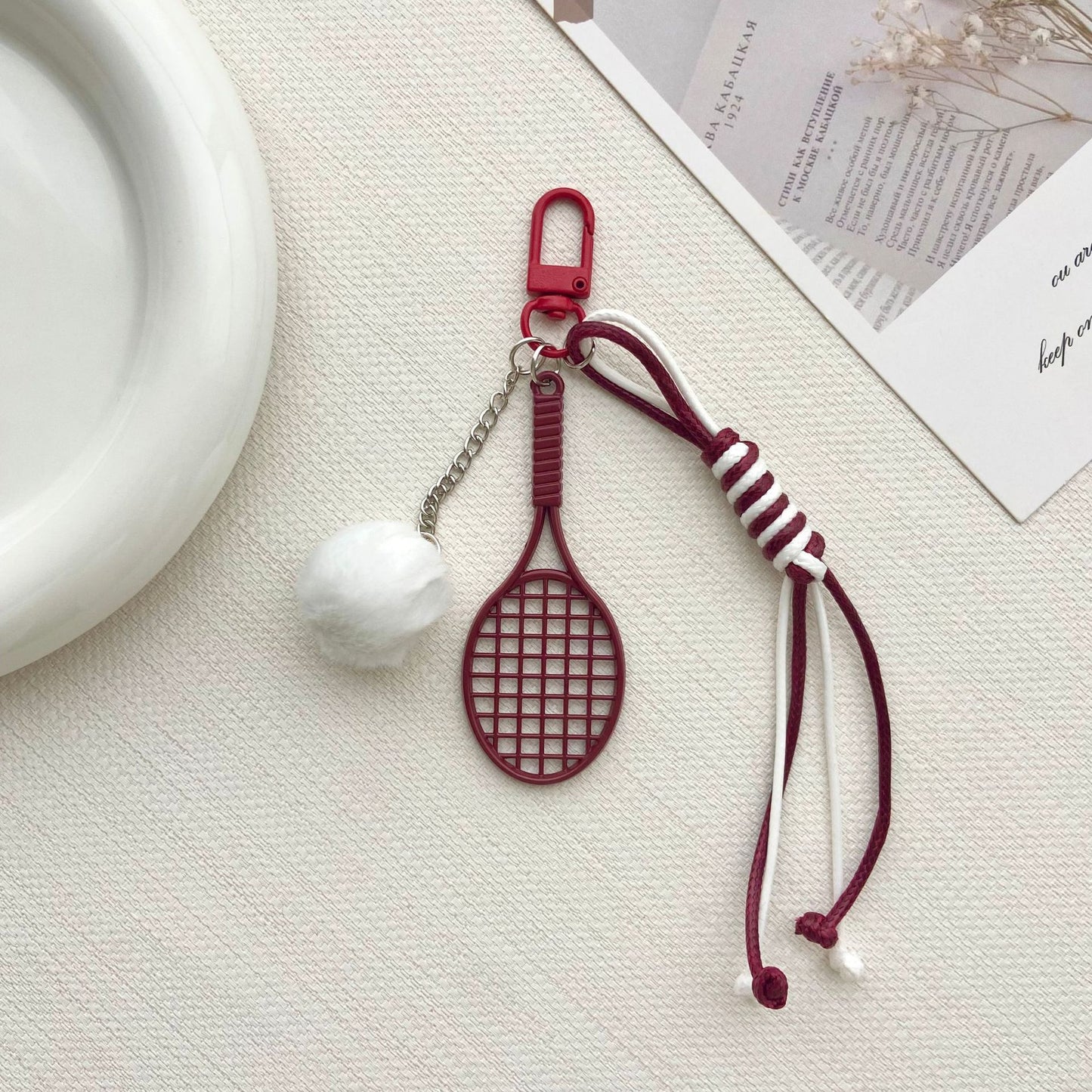 Tennisracket und Pelzball Schlüsselanhänger Brehn