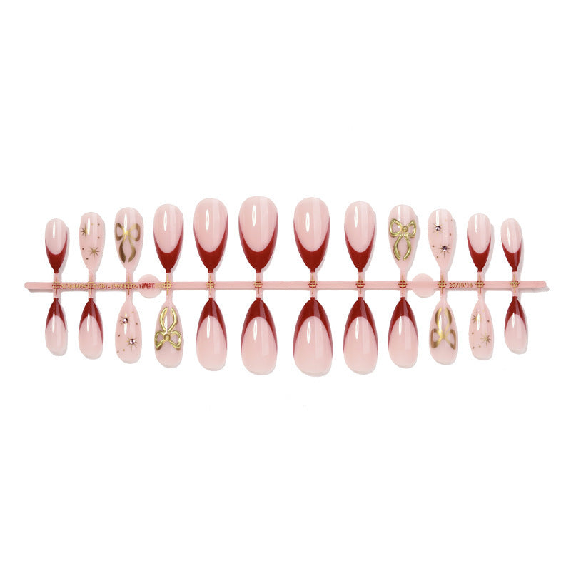 Kunstvolles Nagelset mit Glitzer- und Herzdesign Brehn