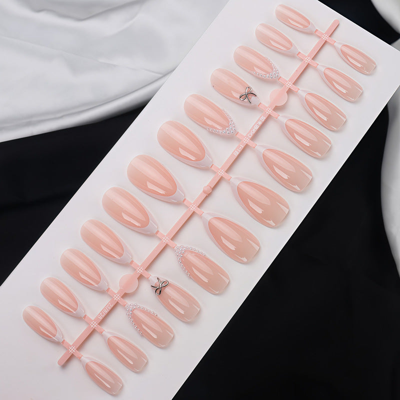 Elegantes Acryl Press-On Nagelset mit Perle und Schleifenakzenten Brehn