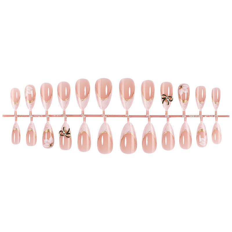 Elegantes Press-On Nail Art Set mit dekorativen Schleifenakzenten Brehn