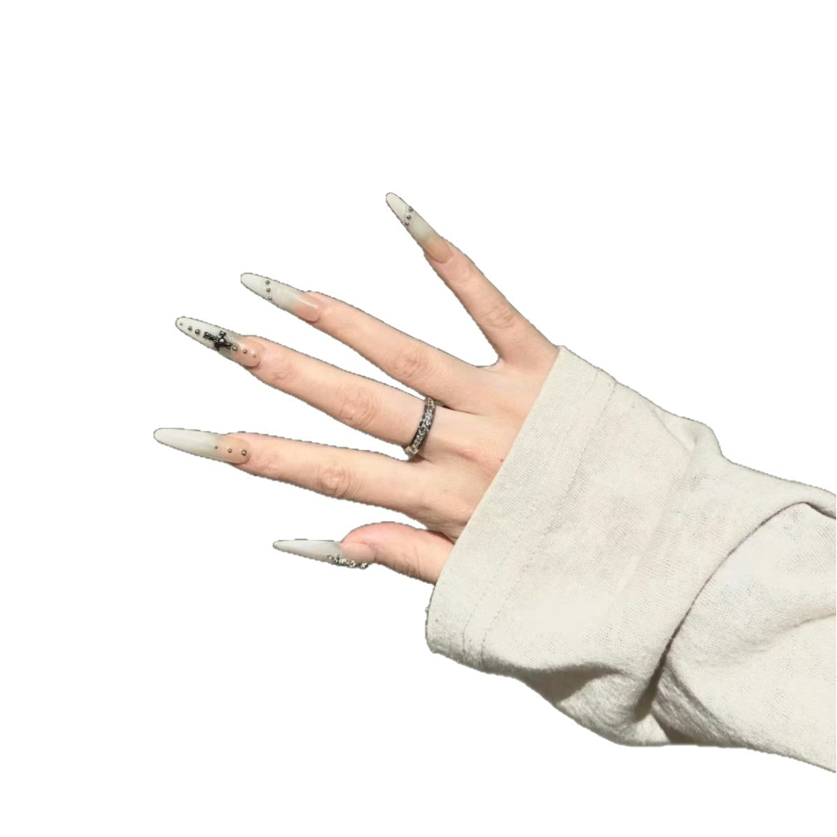 Künstlerische Stiletto-Nagelverlängerungen mit dekorativen Akzenten
