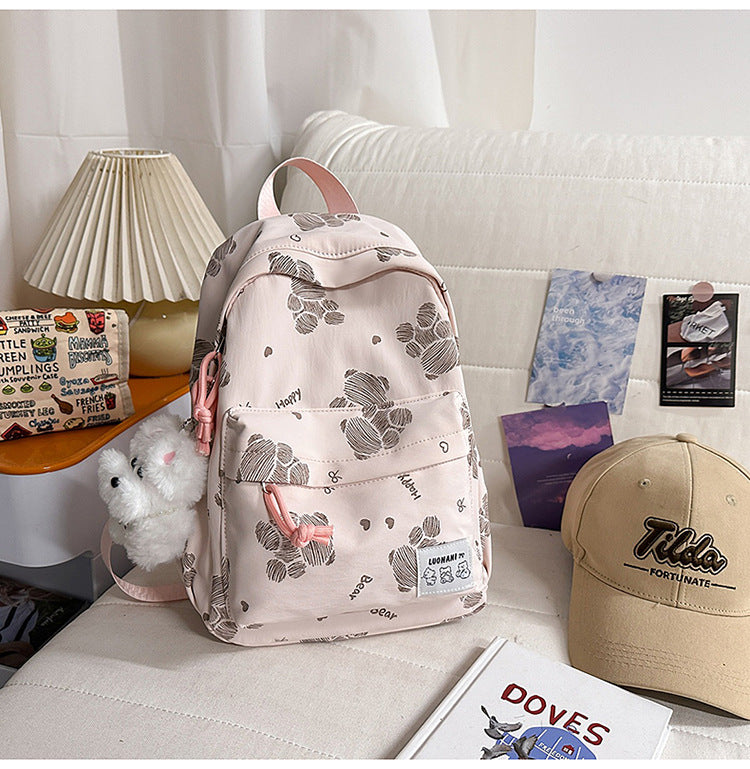 Niedlicher gemusterter Canvas-Schulrucksack