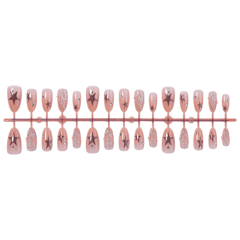 Künstlerisches Press-On Nail Set mit Stern- und Perlenakzenten Brehn