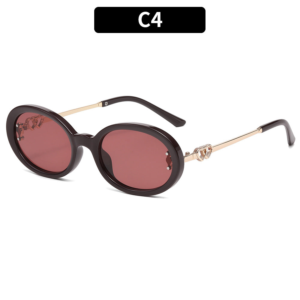 Premium ovale Rahmen-Sonnenbrille mit dekorativen Metallelementen