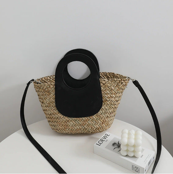 Damen Handtasche aus geflochtenem Material mit Lederdetails Brehn