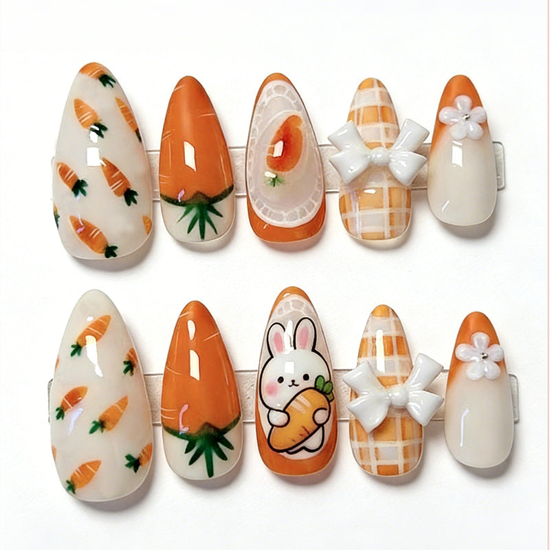 Kunstnagelset mit frühlingshaften Karotten- und Hasenmuster Brehn