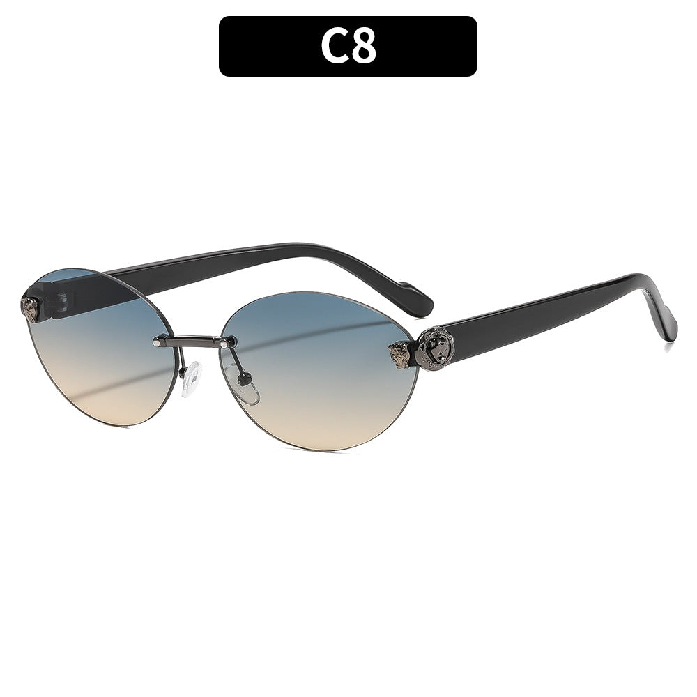 Vintage ovale Sonnenbrille mit goldenen Akzenten