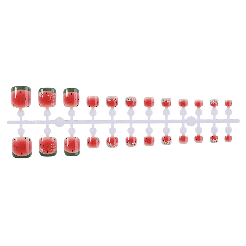 Kreatives Kunstnagelset mit fröhlichen Wassermelonenmotiven und zarten Blütenakzenten Brehn