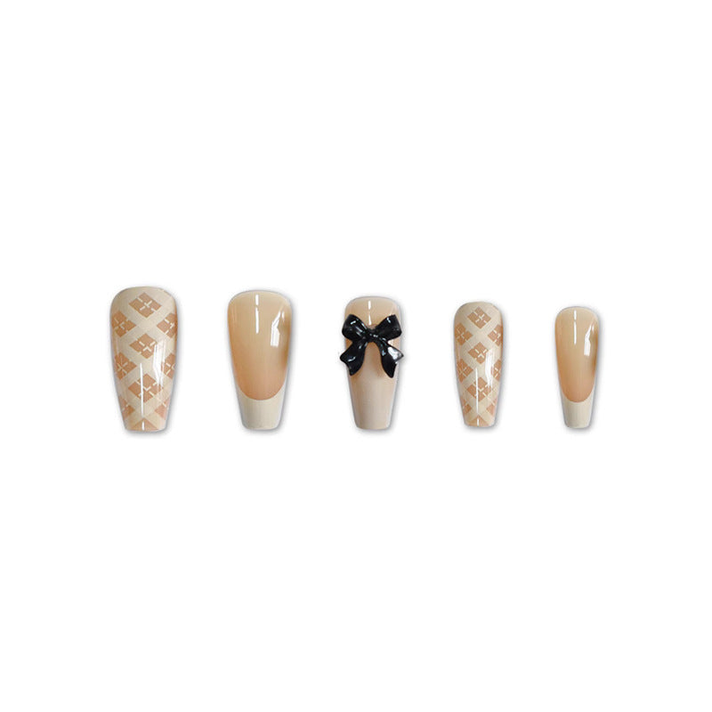 Stylisches Press-On Nagelset mit dekorativen 3D-Schleifenakzenten Brehn