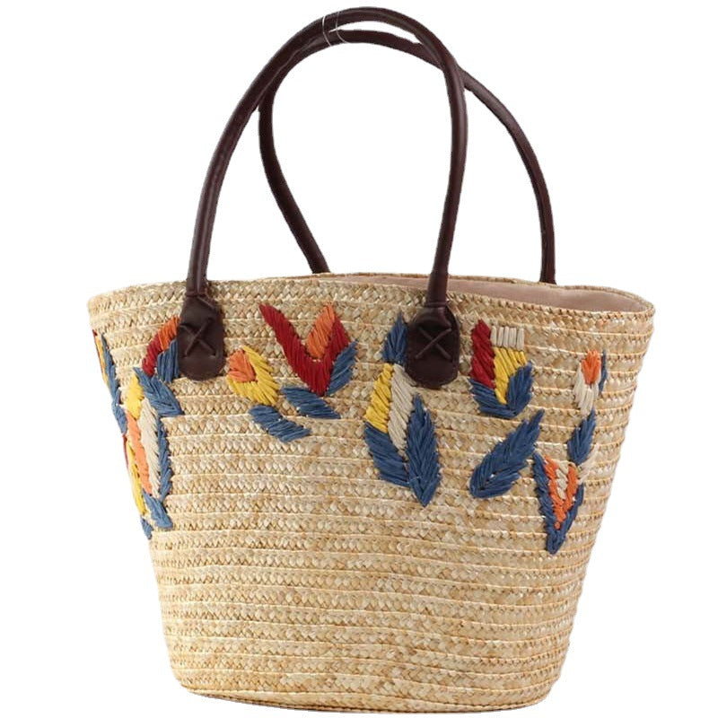Geflochtene Strandtasche mit Farbenfrohem Stickmuster Brehn