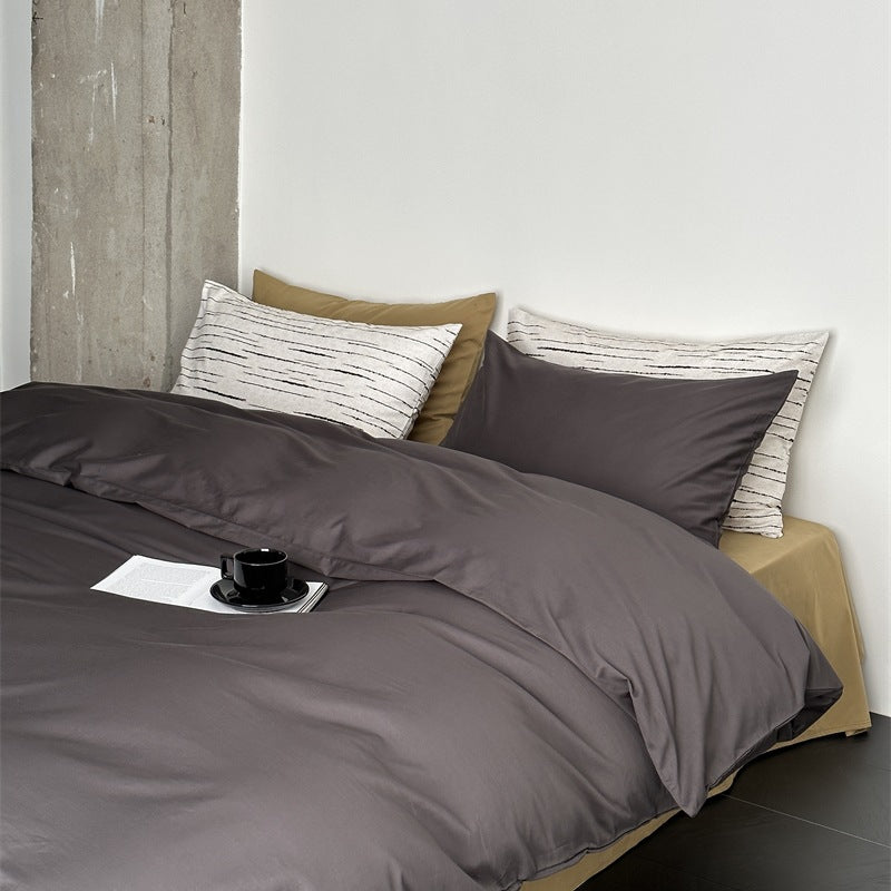Modernes Satin-Bettwäsche-Set mit Steppdecke-Optik und gemusterten Kissenhüllen