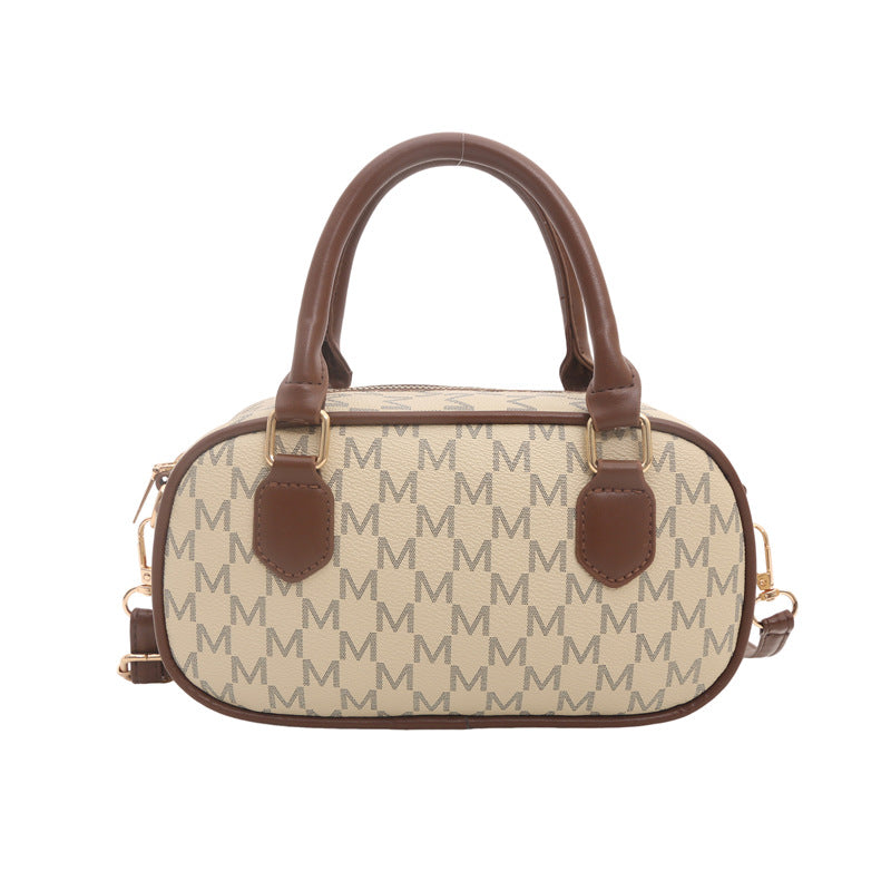 Stylische Monogram-Handtasche