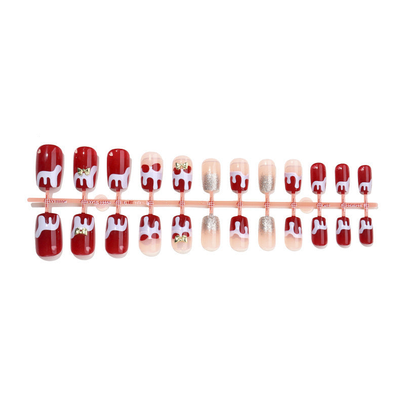 Kreatives Kunstnagelset mit verspieltem Zuckerguss-Design Brehn