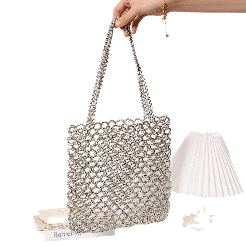 Glitzernde Netzhandtasche Aus Geflochtenem Material Brehn