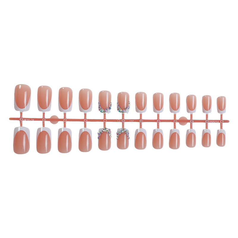 Dekorativer French Tip Press-On Nagelset mit Strass-Akzenten Brehn