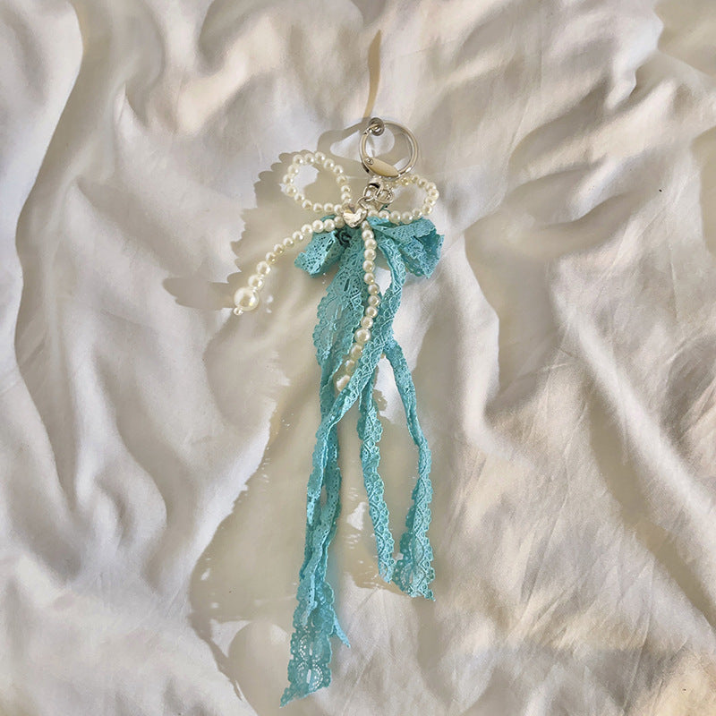 Eleganter mit Perlen verzierter Charm-Schlüsselanhänger Brehn