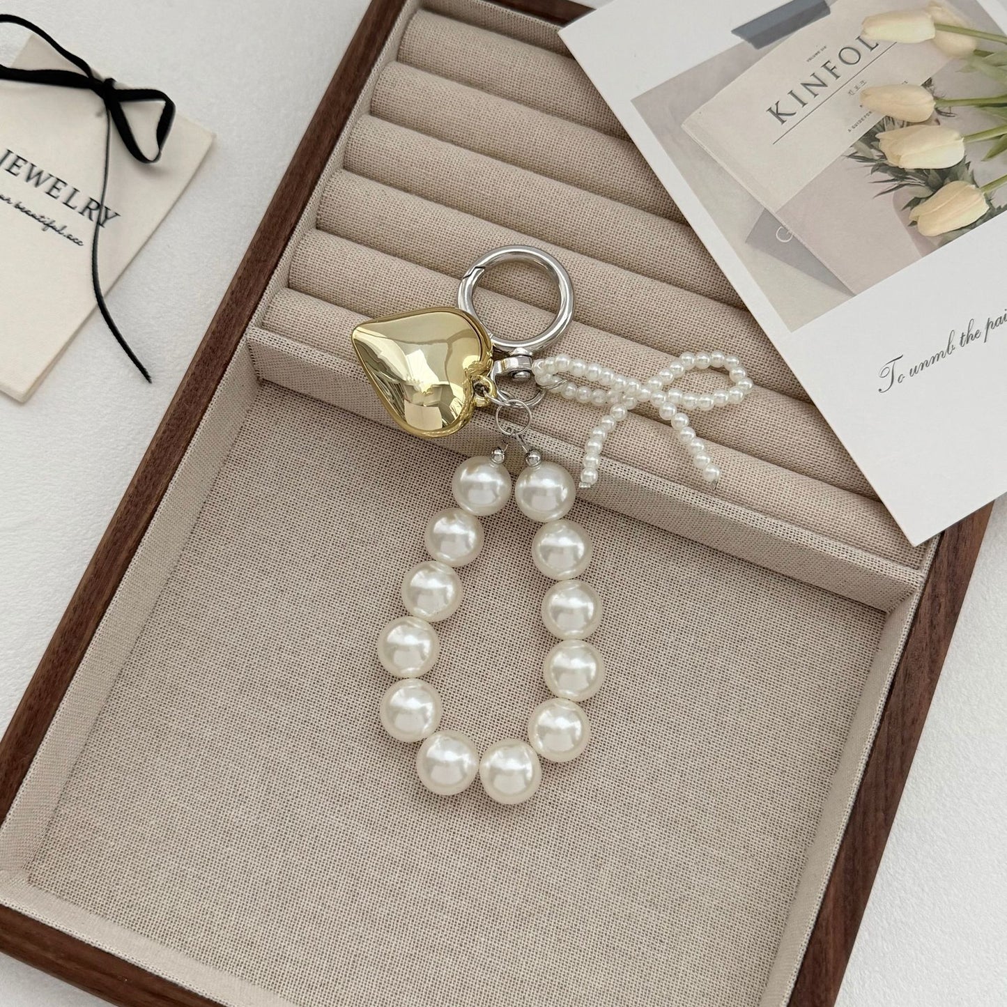 Eleganter Perle Charme Schlüsselanhänger Brehn