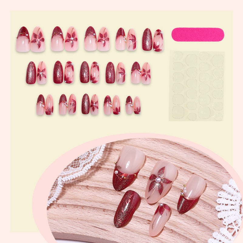 Elegantes Druck-On-Nagelset mit floralem und gem-ähnlichem Akzent Brehn