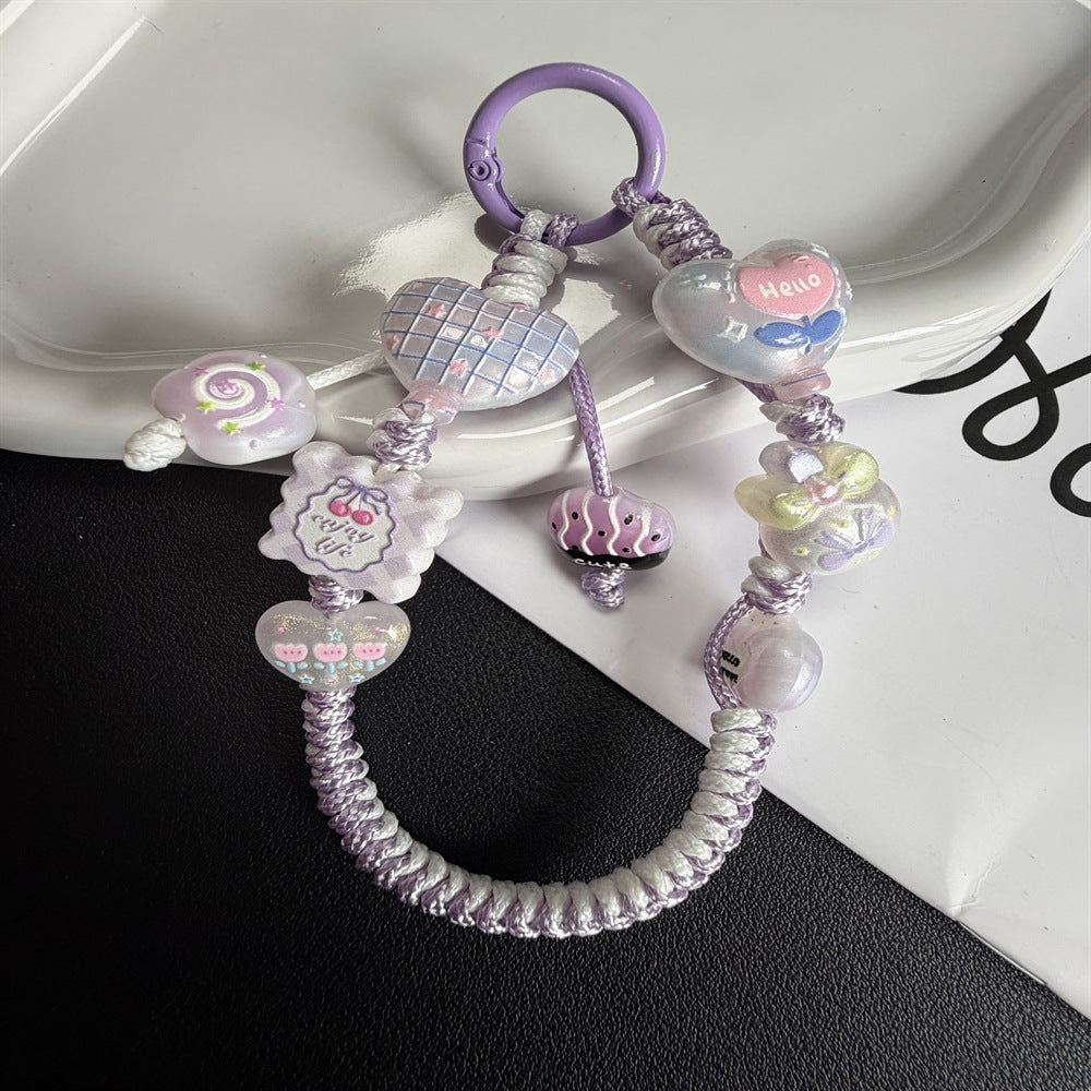 Verspielte Perlencharme-Handyband Brehn 1790134944