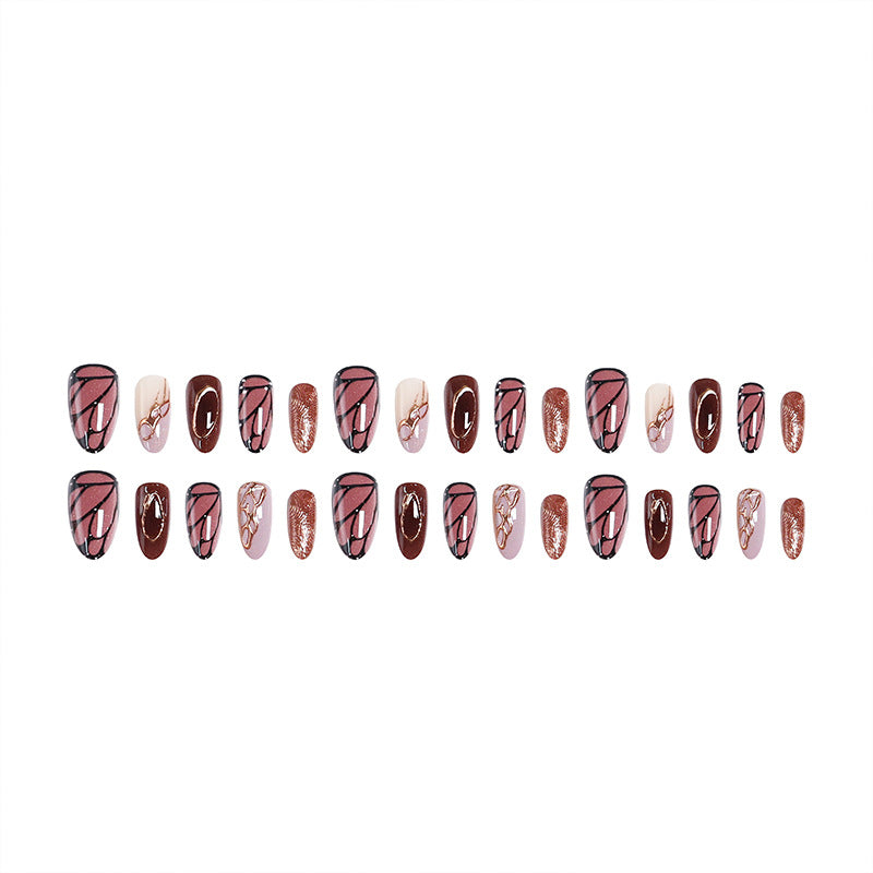Kunstnagelset mit elegantem Gold- und Schwarzdesign Brehn
