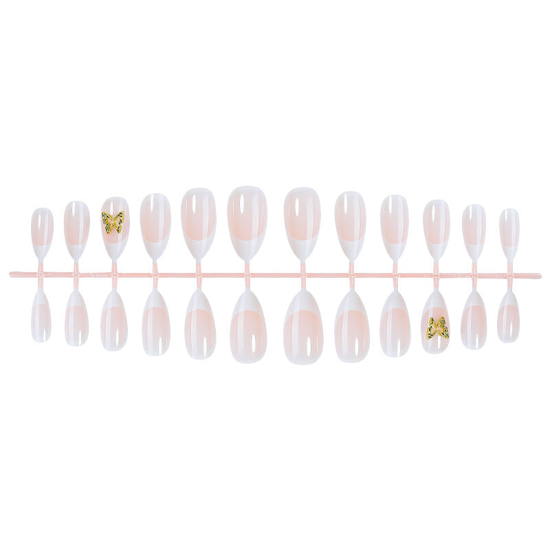 Modisches Press-On-Nagelset mit eleganten French Tips und dekorativen Akzenten Brehn