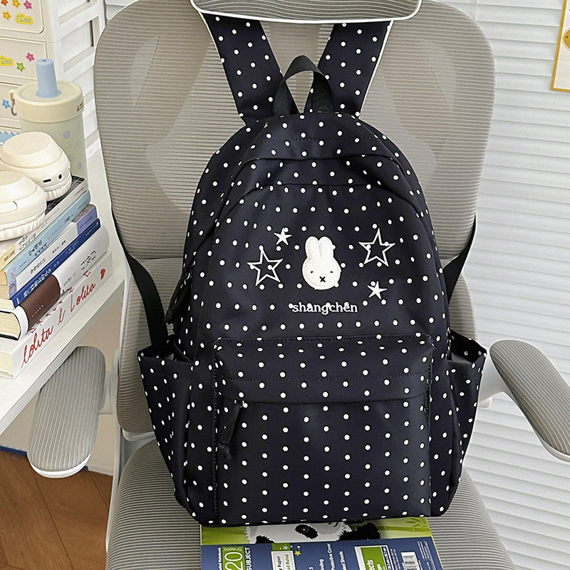Süßer gemusterter Schulrucksack