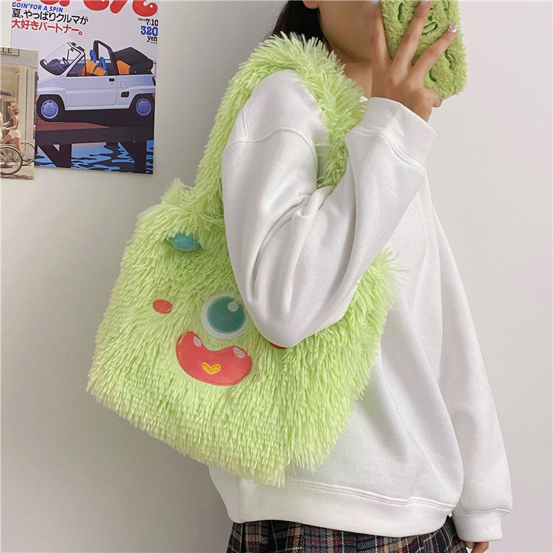 Verspielte Monster Plüschtasche
