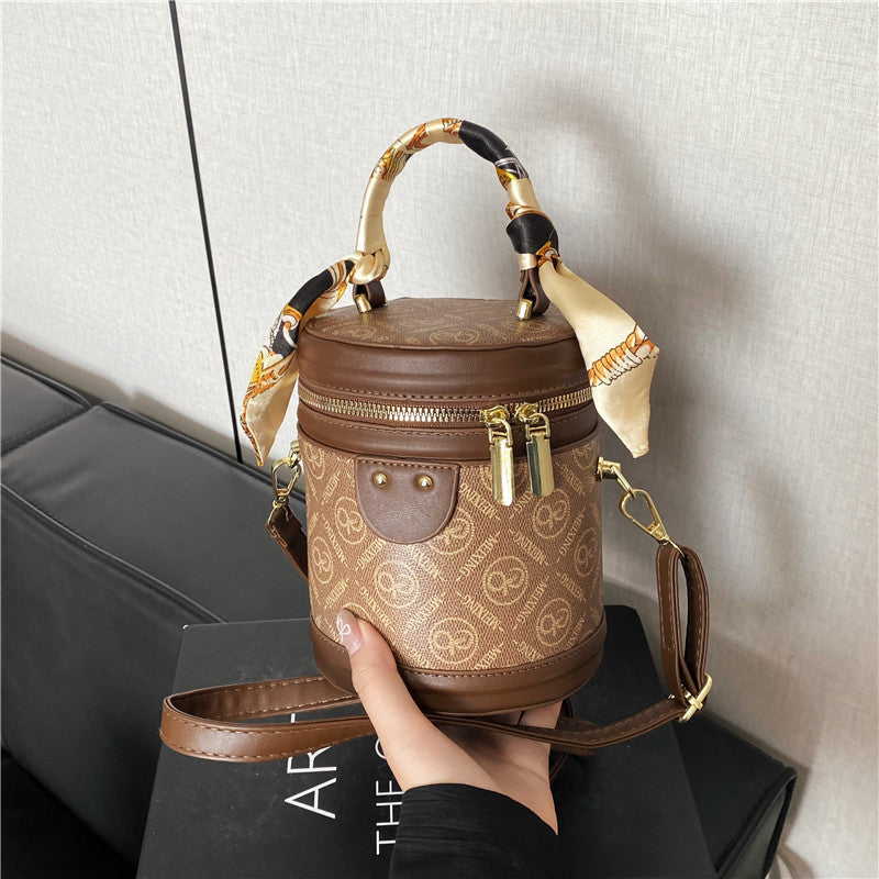 Dekorative runde Handtasche