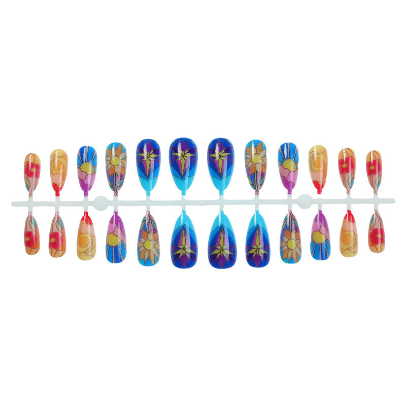 Künstlerisches Press-On-Nagelset mit floralen und geometrischen Mustern Brehn
