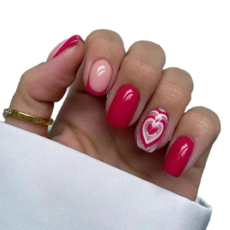 Herz-verzierte Nagelkunst Brehn