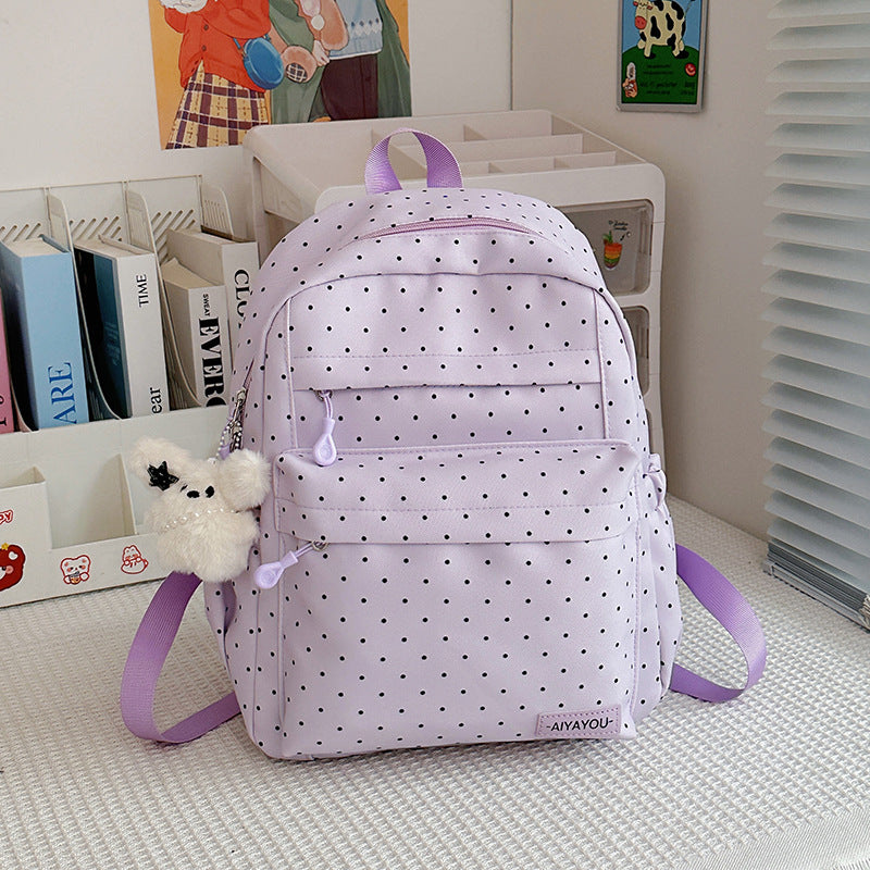 Verspielter gepunkteter Rucksack