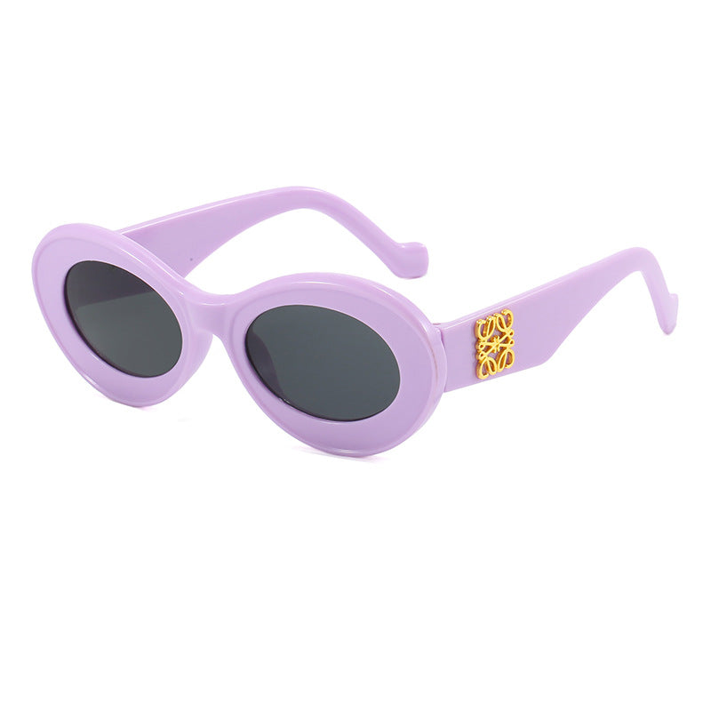 Damen modische Sonnenbrille mit ovalem Rahmen und goldenen Applikationen Brehn
