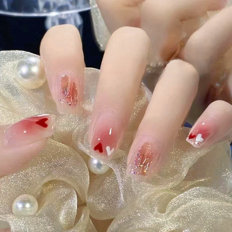 Kunstnagelset mit funkelnden Glitzer- und holografischen Akzenten Brehn